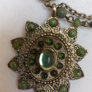 Really cool vintage green pendant on a chain